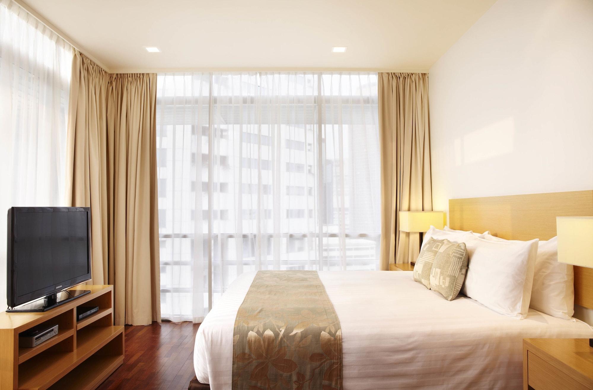 Parkroyal Serviced Suites Kuala Lumpur Exterior foto A bedroom at the hotel