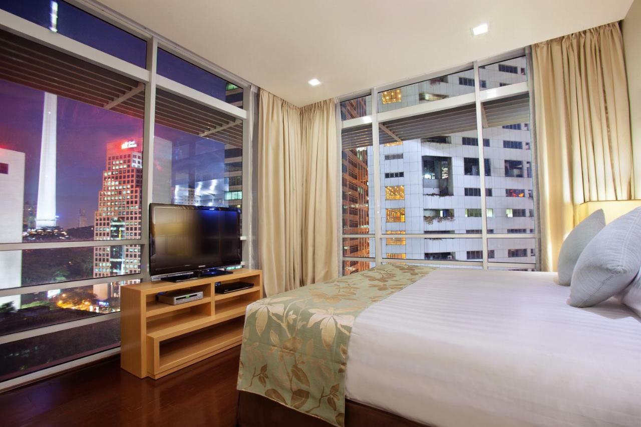 Parkroyal Serviced Suites Kuala Lumpur Exterior foto A bedroom at the hotel